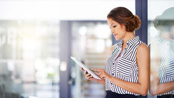 woman-working-on-tablet woman-working-on-tablet